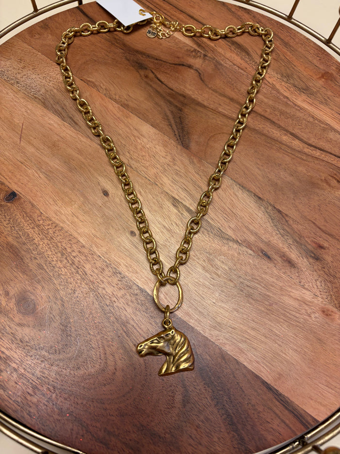 Horsehead pendant necklace by Lula 'n' Lee featuring a detailed metal horsehead charm on a chain.