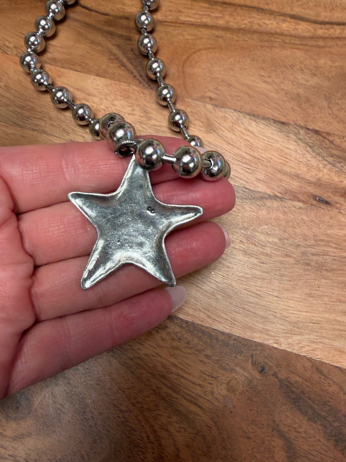 Lula 'n' Lee star ball chain necklace featuring a delicate star pendant on a silver ball chain.