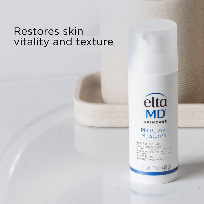 EltaMD PM Restore Moisturizer bottle with text 'Restores skin vitality and texture'