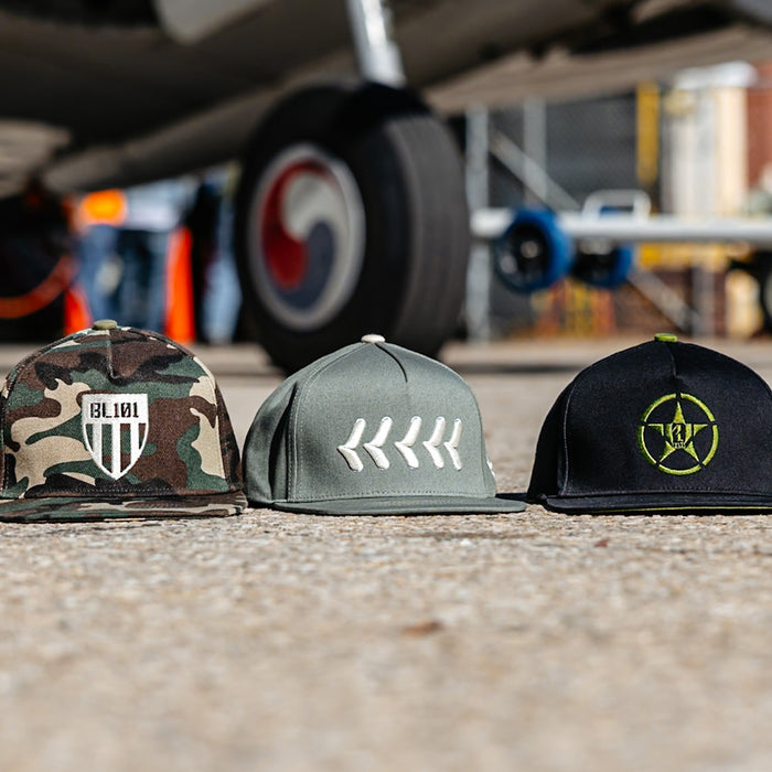 Olive green snapback hat with white embroidered baseball seam stitch design and BL101 logo on the side
Army green snapback hat with white embroidered baseball seam stitch design
Black snapback hat with neon green embroidered baseball seam stitch design