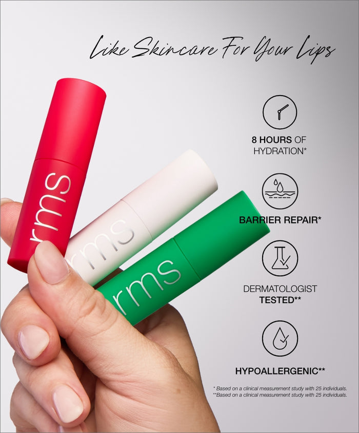 Hand holding The Mini Lip Oil Trio in red, white, and green tubes with text highlighting 8 hours of hydration, barrier repair, dermatologist tested, and hypoallergenic benefits.