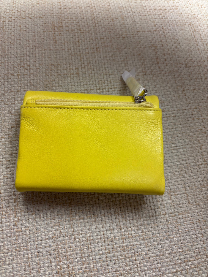 ili New York trifold compact wallet with multiple card slots and a sleek leather finish.