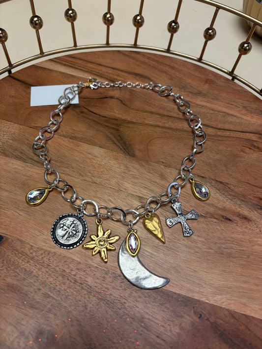 Lula 'n' Lee Charmed by the Moon necklace featuring a delicate moon pendant on a silver chain.