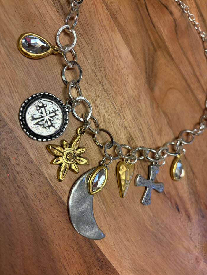 Lula 'n' Lee Charmed by the Moon necklace featuring a delicate moon pendant on a dainty chain.