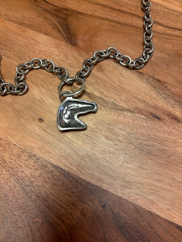 Lula 'n' Lee horsehead pendant necklace showing a detailed metal horsehead charm on a chain.