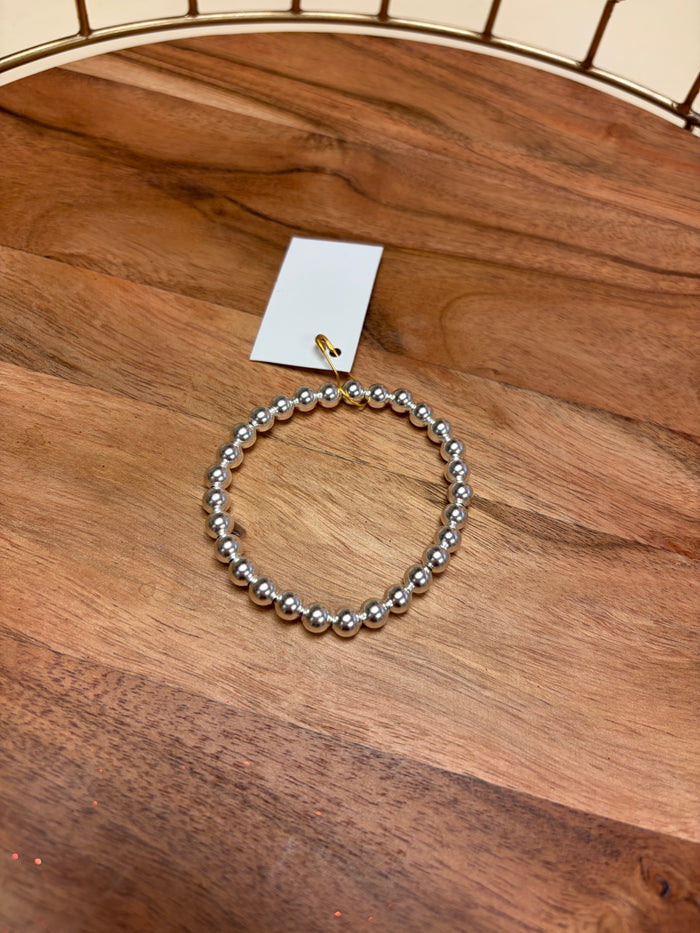 Sterling silver beaded bracelet by Lula 'n' Lee featuring round silver beads and a secure clasp.