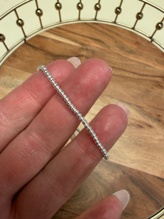 Sterling silver beaded bracelet by Lula 'n' Lee featuring round silver beads on a delicate chain.