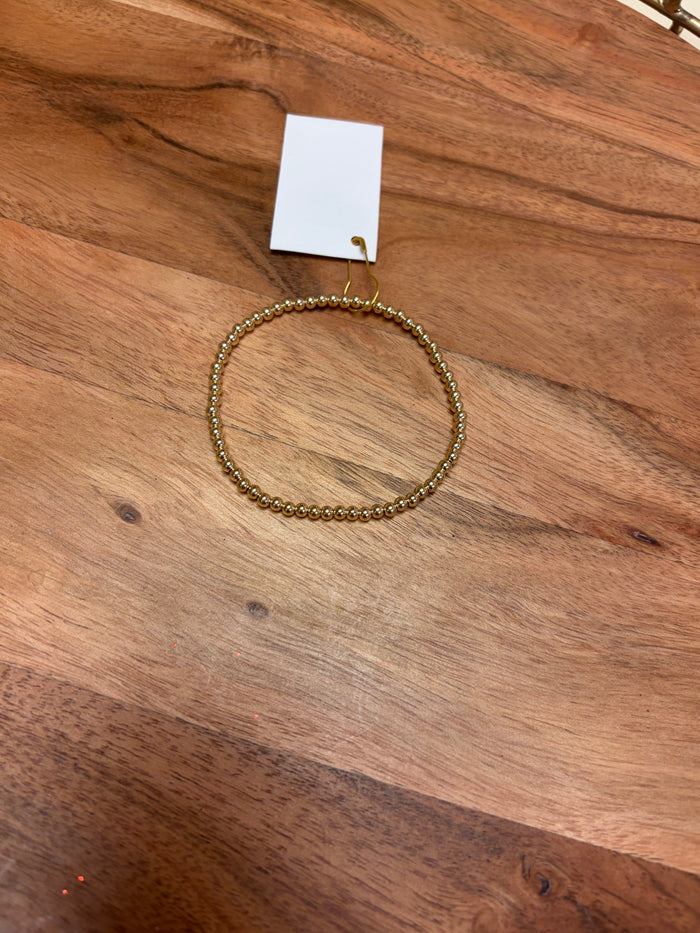 Gold filled beaded bracelet by Lula 'n' Lee featuring multiple gold beads on a delicate chain.