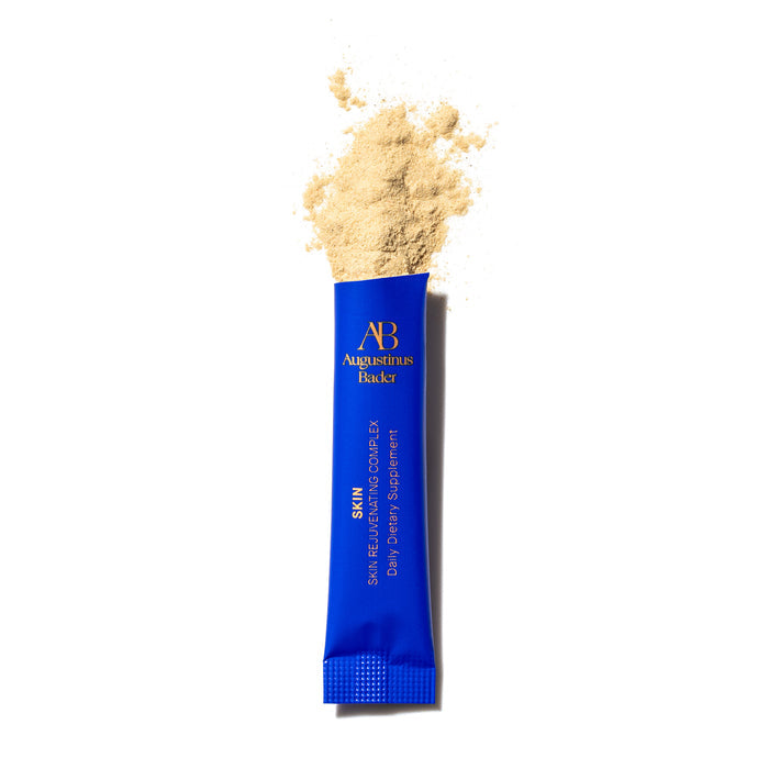 Augustinus Bader Skin Rejuvenating Complex daily dietary supplement sachet with powder spill