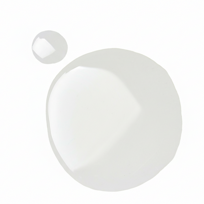 Transparent body oil drops on white background for Augustinus Bader The Body Oil