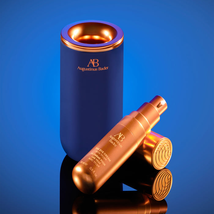 Augustinus Bader The Eye Cream with gold pump bottle and navy case
