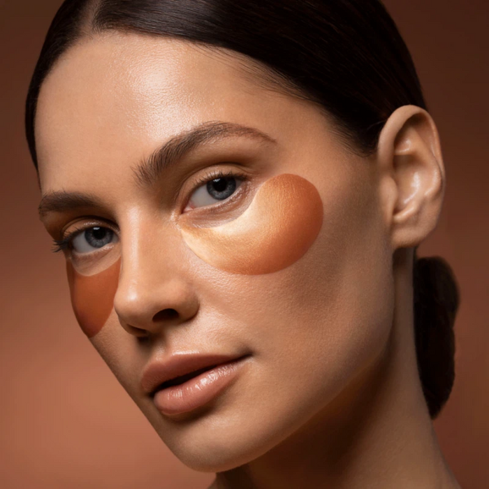 Woman wearing Augustinus Bader The Eye Patches under eyes