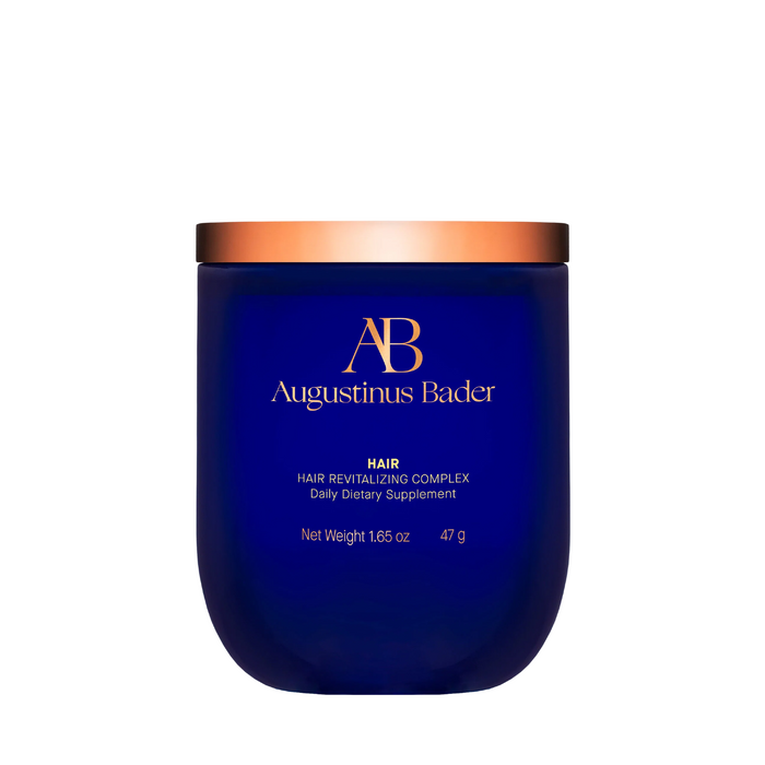 Augustinus Bader The Hair Revitalizing Complex supplement jar in blue with gold lid