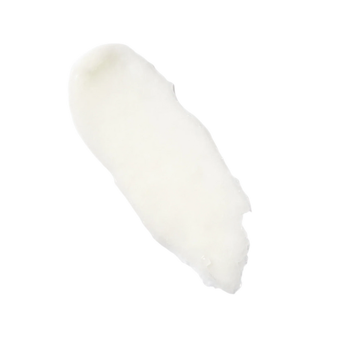 Creamy white Augustinus Bader lip balm texture swatch for hydrating lip care