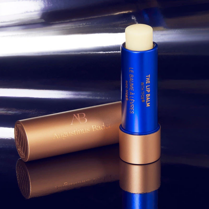 Augustinus Bader The Lip Balm in blue and gold tube with TFC8