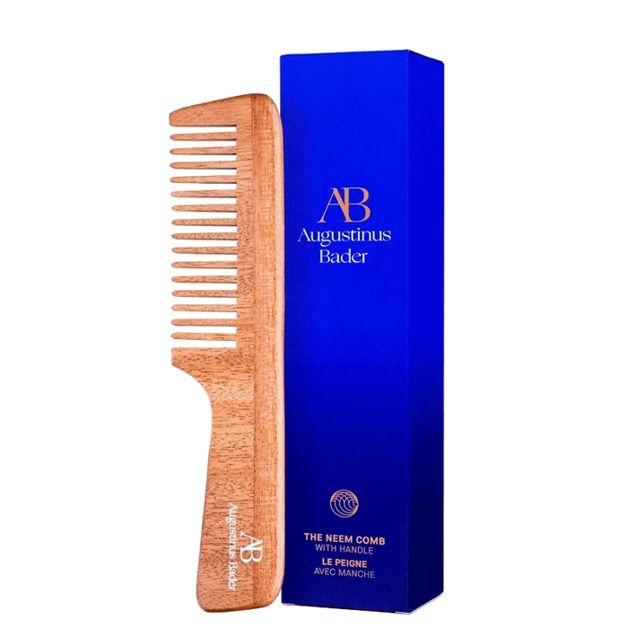 Augustinus Bader The Neem Comb with handle in neem wood, shown with blue packaging