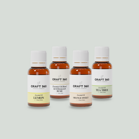 A collection of 4 bottles of Essential Oils from Craft 360 for clean air. Lemon, Australian Bush Blend, Tea Tree, Orange.
