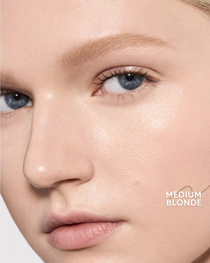light skin toned model wearing brow MVP in medium blonde