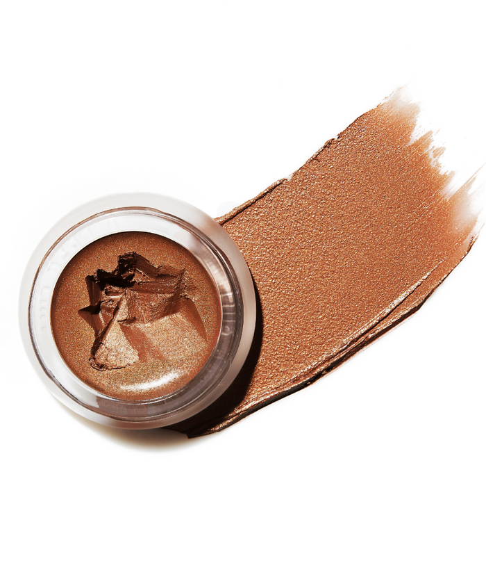 Close-up of Buriti Bronzer, and a swatch of Buriti Bronzer showing the creamy texture.