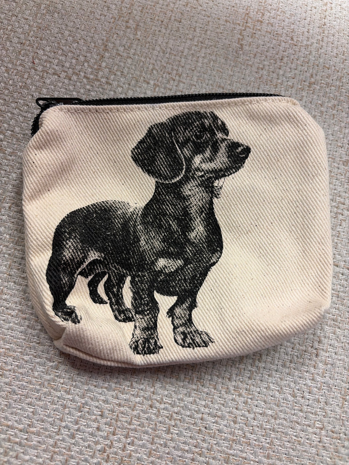 Canvas zip pouch from Rubyzaar featuring a compact bag with a zipper closure and natural fabric design.