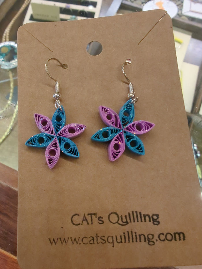 Cats Quilling Earrings by Cat's Quilling featuring delicate, colorful quilled cat-shaped earrings on silver hooks.