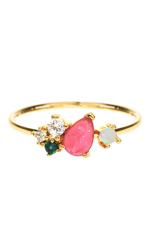Gold-tone cluster ring with pink teardrop center stone and small clear, green accents
