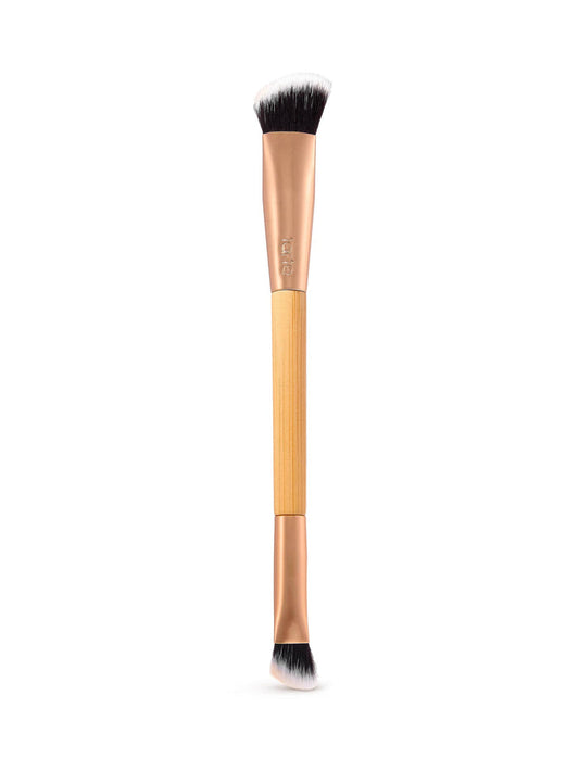Makeup brush with black bristles on a white background