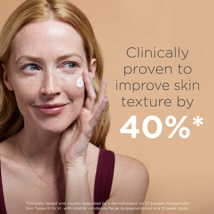 Woman applying tinted sunscreen cream; clinically proven to improve skin texture by 40%