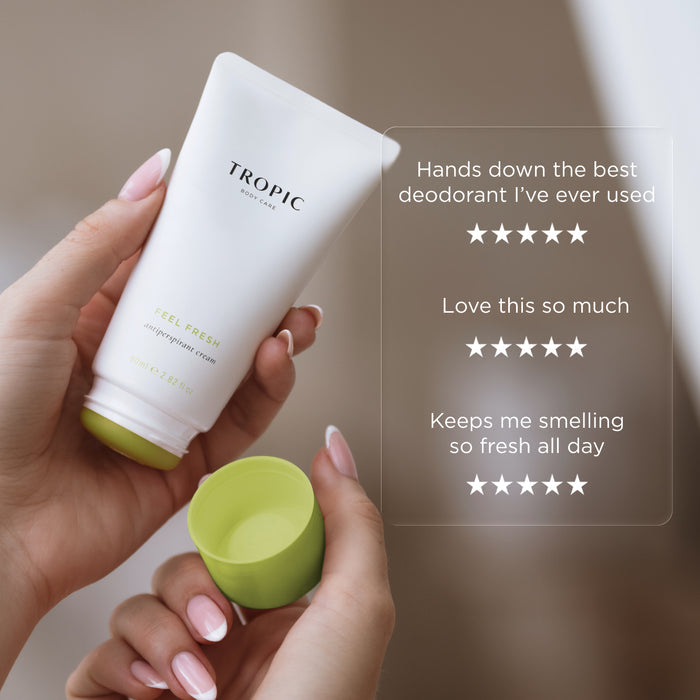 A person holds a white tube of deodorant cream with a bright green cap, shown against a soft beige background with reviews on the right. "hands down the best deodorant I've ever user" "Love this so much" "Keeps me smelling so fresh all day"