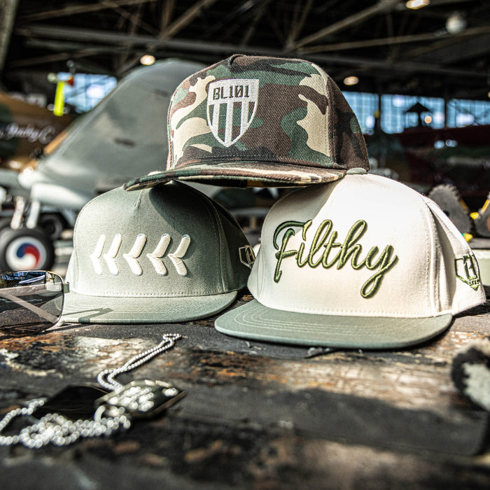 Olive green snapback hat with white embroidered baseball seam stitch design and BL101 logo on the side

Army green snapback hat with white embroidered baseball seam stitch design 

Black snapback hat with neon green embroidered baseball seam stitch design