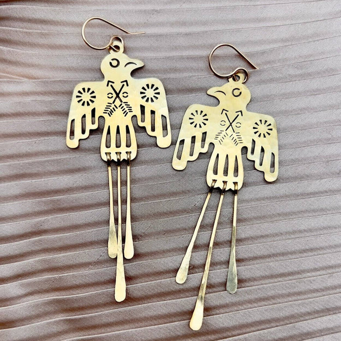 Gold Glide Earrings by Fluff Hardware featuring sleek, minimalist design with smooth, curved shapes for a modern jewelry look.