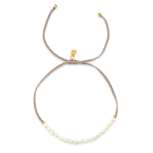 Handmade beaded bracelet with lavender beads and pearl accents, gold clasp details