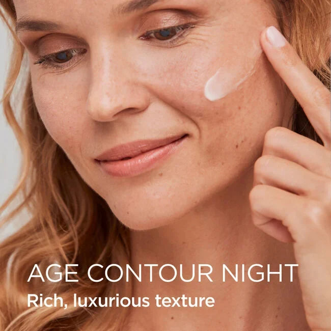 Woman applying Age Contour Night cream to cheek, rich night moisturizer for face and neck