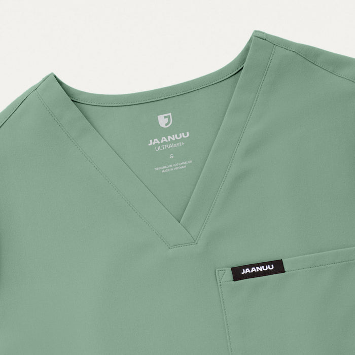 JAANUU Rhena Slim Essential 1 pocket Scrub Top Sage - Get Scrubbed