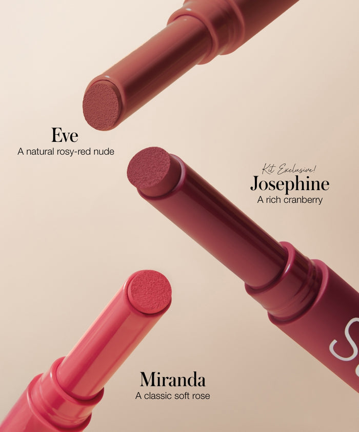 Three RMS Beauty lip colors in shades Eve, Josephine, and Miranda displayed with soft lighting, part of the Legends To Love Kit featuring clean beauty and natural ingredients.