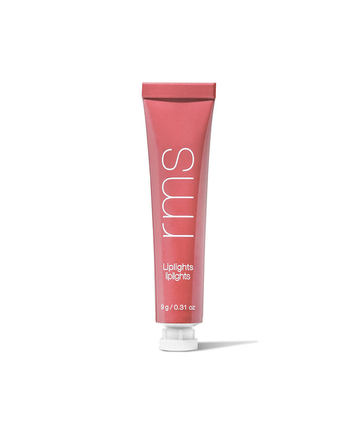 A pink tube of Liplights Cream Lip Gloss by RMS Beauty featuring clean, natural ingredients in recyclable packaging, designed as a sustainable, cruelty-free makeup option.