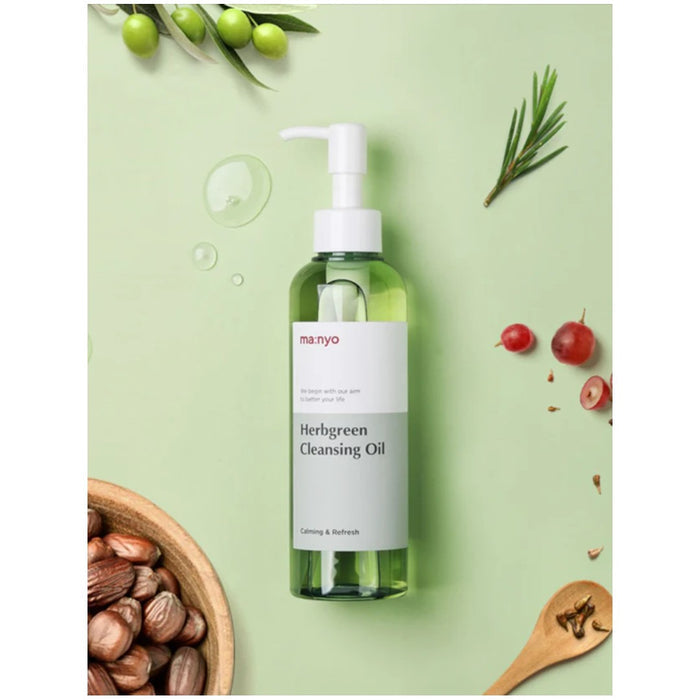 ma:nyo Herb Green Cleansing Oil 200ml in a pump bottle on a green background with natural elements.