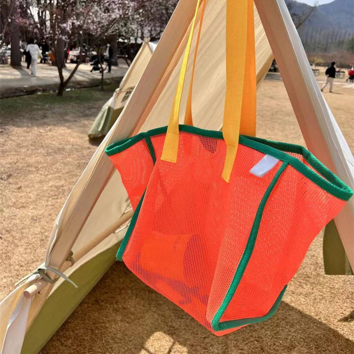 ACCITY mesh beach bag with breathable design and sturdy handles, perfect for carrying towels, sunscreen, and beach accessories.