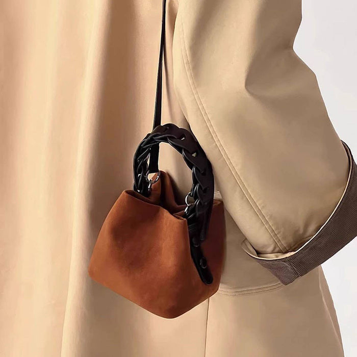Mini woven bag from ACCITY, featuring a stylish, compact design with intricate weaving and a top handle for everyday use.