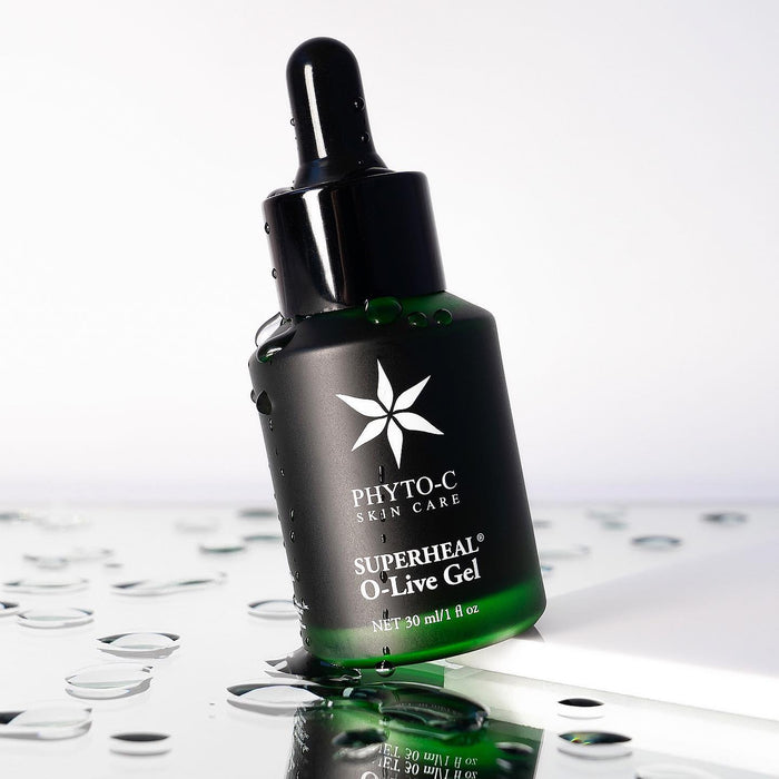 Phyto-C Superheal O-Live Gel dropper bottle with green liquid and water droplets