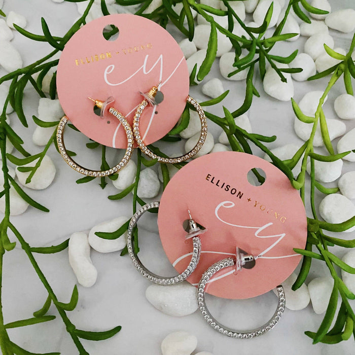 Reversible hoop earrings by Ellison+Young featuring plain and shine finishes, shown in a close-up image.