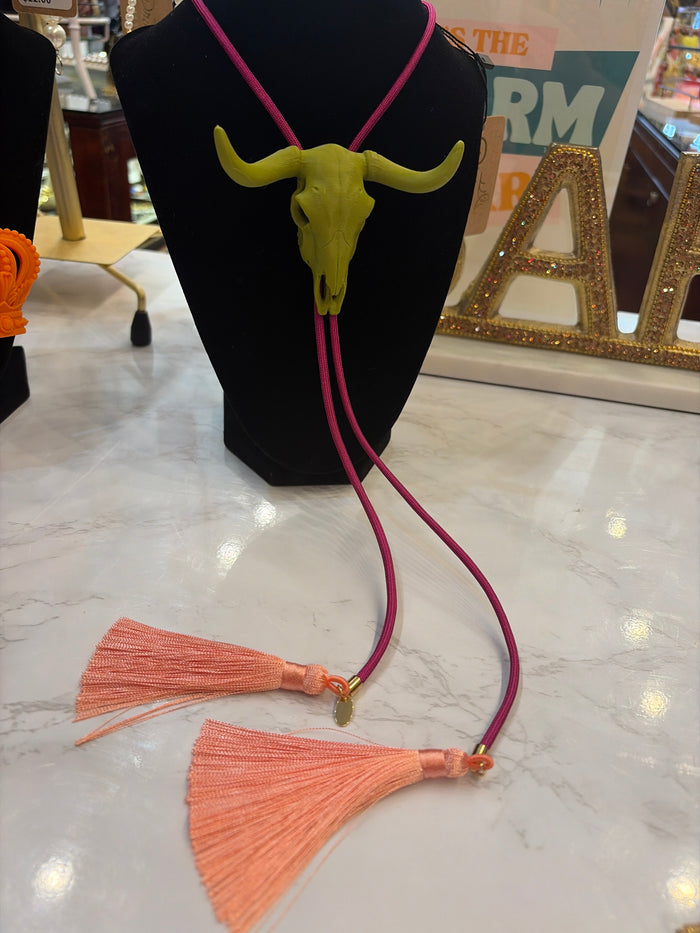 Rahya Jewelry Design Bolo Necklace featuring a stylish bolo tie with intricate silver detailing and adjustable cord.
