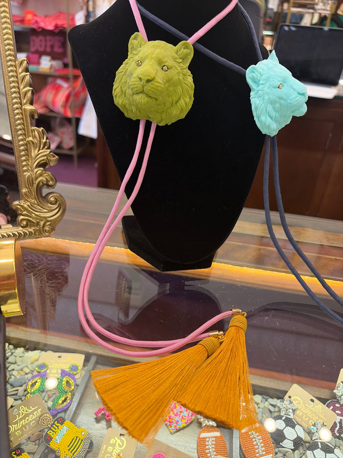 Rahya Bolo Necklace by Rahya Jewelry Design featuring a stylish bolo tie with decorative metal tips and intricate cord detailing.