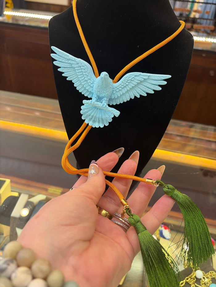 Rahya Bolo Necklace from Rahya Jewelry Design featuring a stylish bolo tie with intricate metal details and adjustable length.
