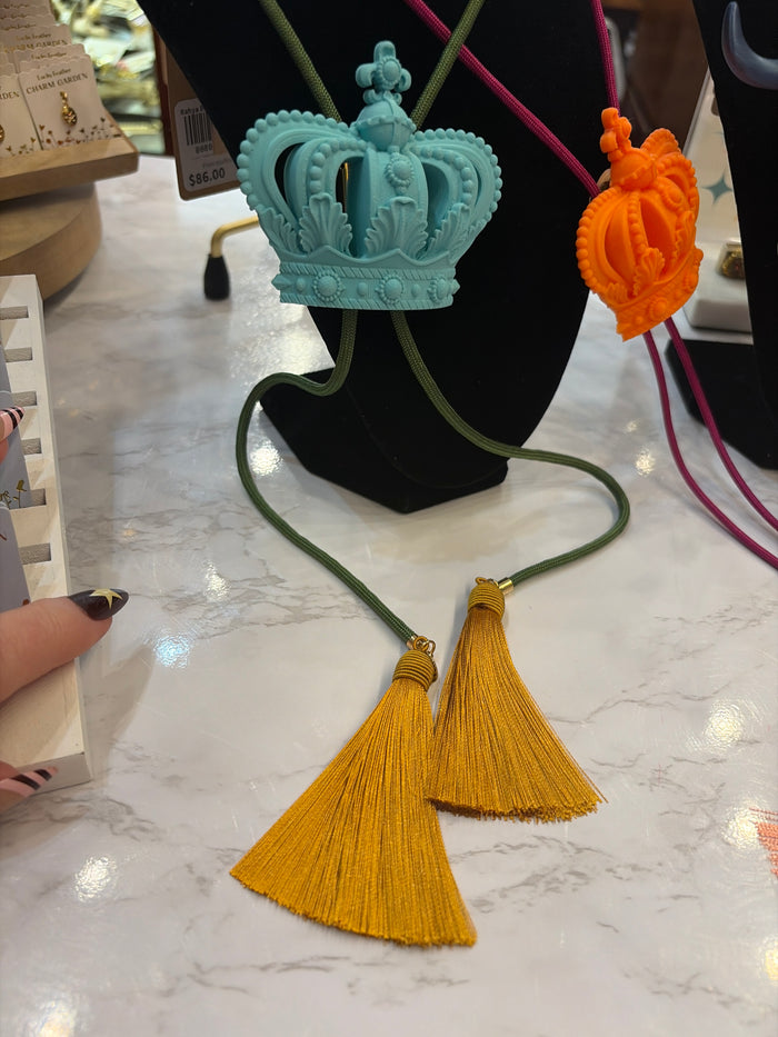 Rahya Jewelry Design Bolo Ties necklace featuring a stylish adjustable bolo tie with intricate metal details and a sleek design.