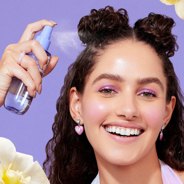 Applying Aqualogica vanilla perfume