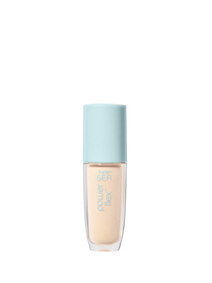 Foundation bottle with light blue cap on a white background