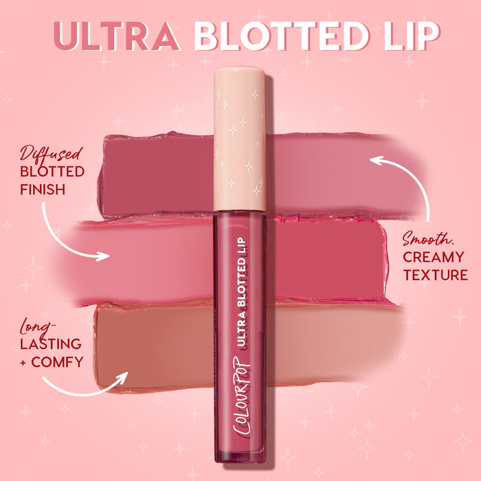 ColourPop Ultra Blotted Lip in Starling stands upright with a beige star‑print cap over mauve and nude swatches, highlighting a diffused blotted finish, smooth creamy texture, and long‑lasting comfy wear on a pink starry background.