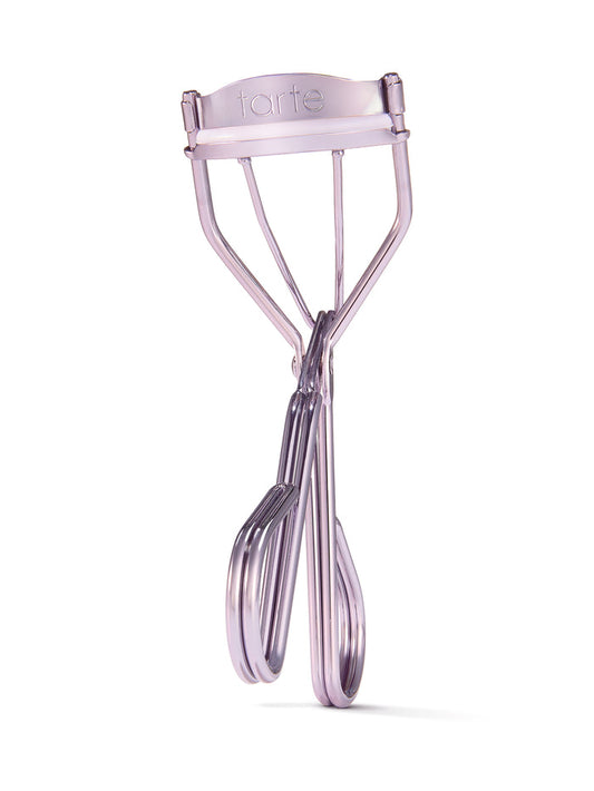 Lash curler with 'tarte' branding on a white background