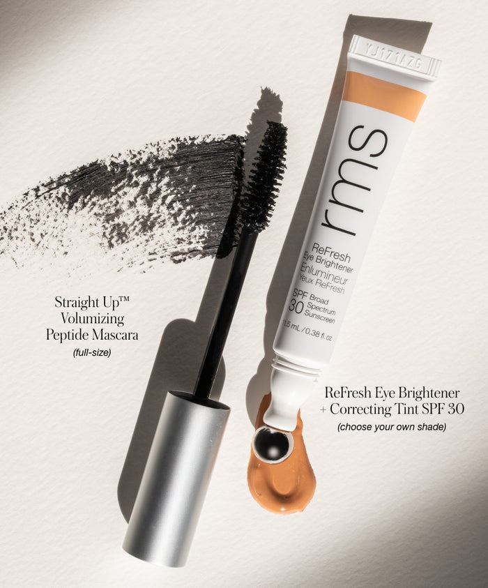 The Wide Awake Duo featuring RMS Beauty mascara with a bold black brush stroke and a tube of ReFresh Eye Brightener with SPF 30 in a warm natural shade on a light background.